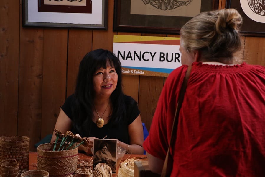 nancy-with-guest-at-table